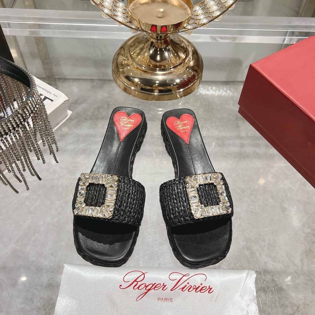 ESPADRILLES MULES IN BLACK RAFFIA